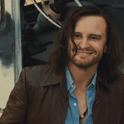 Man With Long Hair And Beard Giving Peace Sign GIF
