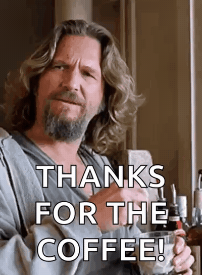 Man With Long Hair And Beard Holding Coffee Says Thanks GIF