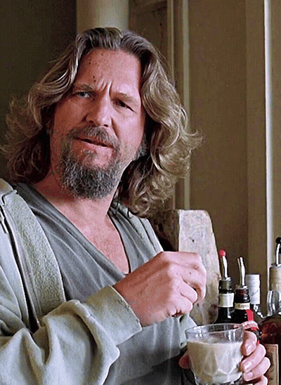 Man With Long Hair And Beard Holding Milk GIF