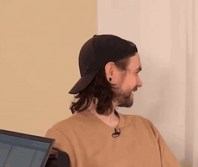Man With Long Hair And Beard In Baseball Cap GIF