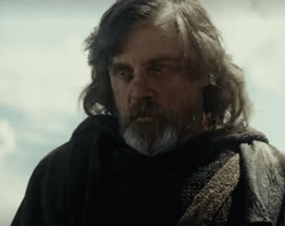 Man With Long Hair And Beard In Black Coat And Scarf GIF