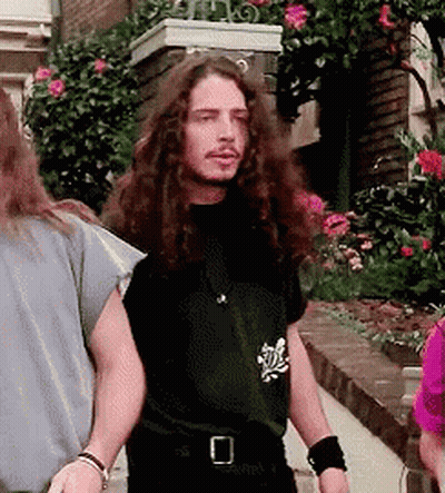 Man With Long Hair And Beard In Black Shirt With O GIF