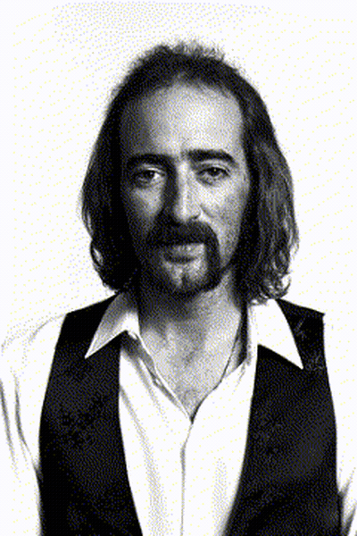 Man With Long Hair And Beard In Black Vest GIF