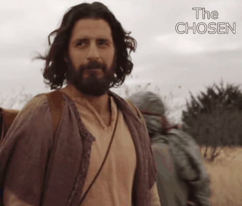 Man With Long Hair And Beard In Field With The Chosen GIF