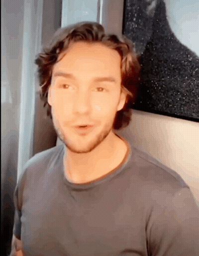 Man With Long Hair And Beard In Grey T-Shirt GIF