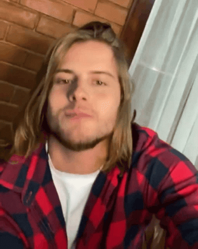 Man With Long Hair And Beard In Plaid Shirt GIF