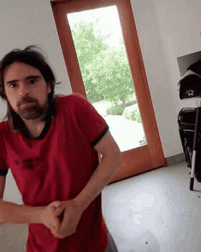 Man With Long Hair And Beard In Red Abercrombie & Fitch Shirt GIF