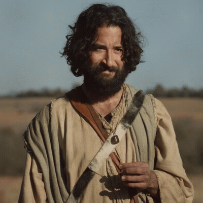 Man With Long Hair And Beard In Sheepskin Strap GIF