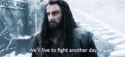 Man With Long Hair And Beard In Snow Saying We'll Live To Fight Another Day GIF