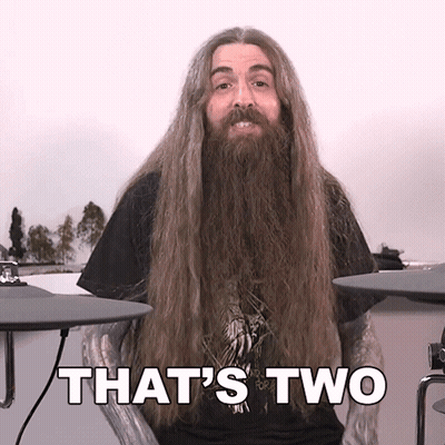 Man With Long Hair And Beard Playing Drums Saying That's Two GIF