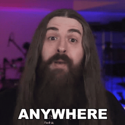 Man With Long Hair And Beard Saying Anywhere GIF