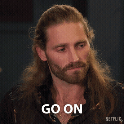Man With Long Hair And Beard Saying Go On GIF