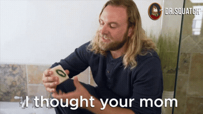 Man With Long Hair And Beard Saying I Thought Your Mom Holding Card GIF