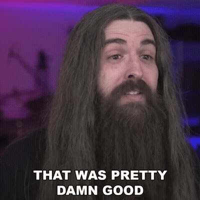 Man with Long Hair and Beard Saying That Was Pretty Damn Good