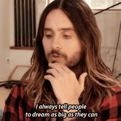 Man With Long Hair and Beard Says Dream As Big As You Can