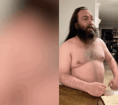 Man With Long Hair And Beard Sitting GIF