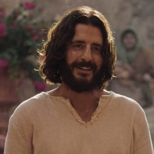 Man With Long Hair And Beard Smiles GIF