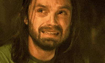 Man With Long Hair And Beard Smiling Looking Up GIF