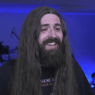 Man With Long Hair And Beard Smiling Saying Ridiculous GIF