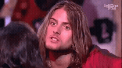 Man With Long Hair And Beard Standing Next To Woman GIF