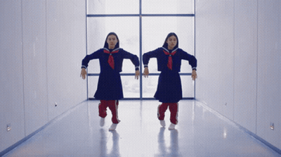 Man With Long Hair And Beard Standing Next To Woman With Long Hair GIF