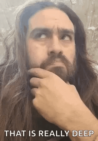 Man With Long Hair And Beard Thinking GIF