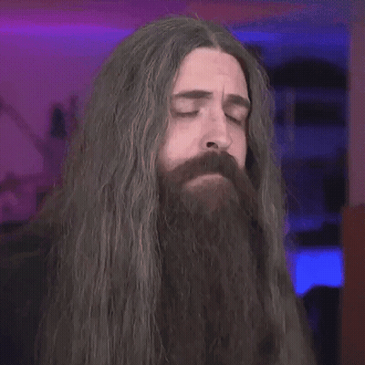Man With Long Hair And Beard Thinking Hand On Chin GIF