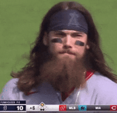 Man With Long Hair And Beard Wearing Headband With Letter T GIF