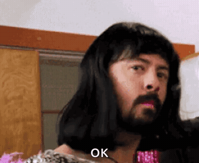 Man With Long Hair And Beard Wearing Wig And Lipstick Saying OK GIF