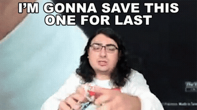 Man With Long Hair And Glasses Holding Bottle GIF