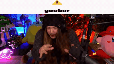 Man With Long Hair And Headphones Making Funny Face At Microphone GIF