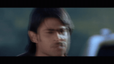 Man With Long Hair And Mustache Close Up GIF