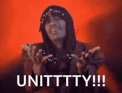 Man With Long Hair And Pearls Says Unittty GIF