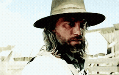 Man With Long Hair Beard Hat Looking Camera GIF