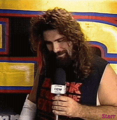 Man With Long Hair Beard Talking Into TCW Microphone GIF