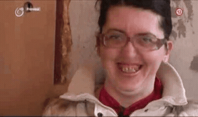 Man With Long Hair Between Two Men GIF