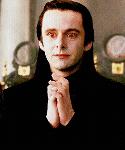 Man With Long Hair Folding Hands GIF