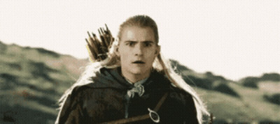 Man With Long Hair Holding Bow And Arrow GIF