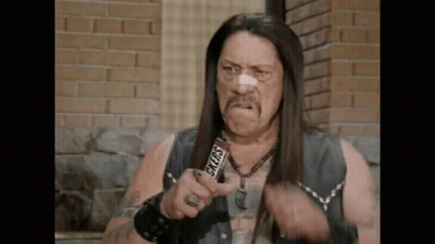 Man With Long Hair Holding Snickers Bar GIF