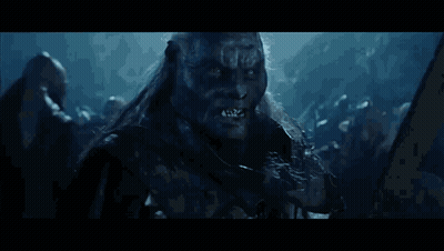 Man With Long Hair Holding Sword GIF