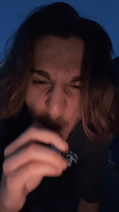 Man With Long Hair In Black Shirt Saying Court GIF