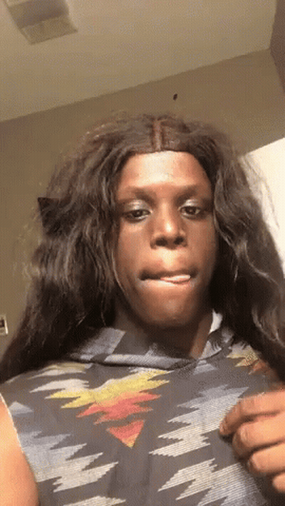 Man With Long Hair In Native American Shirt GIF