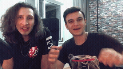 Man With Long Hair In Off White Shirt GIF