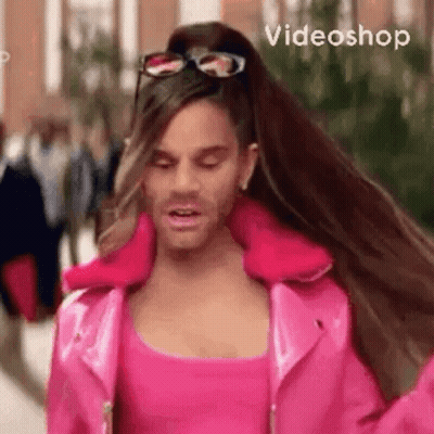 Man With Long Hair In Pink Jacket GIF