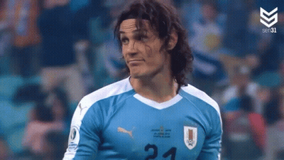 Man With Long Hair In Soccer Jersey Number 21 GIF