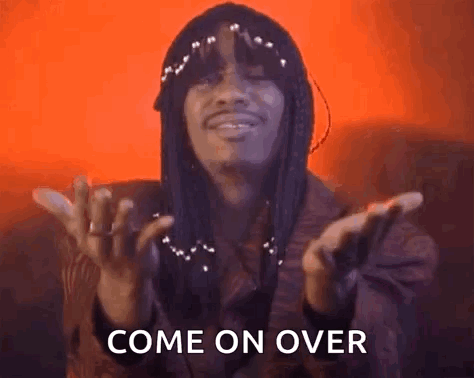Man With Long Hair Making Funny Face Says Come On Over GIF