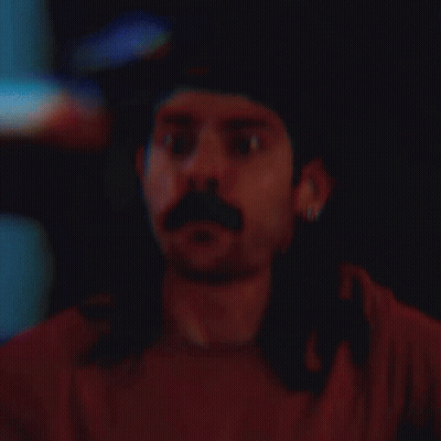 Man With Long Hair Mustache Baseball Cap Earrings GIF