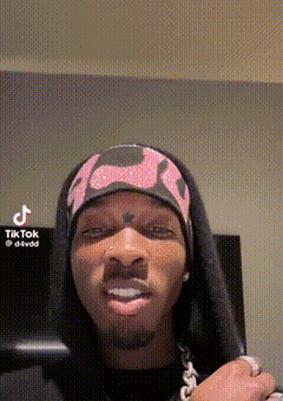 Man With Long Hair Pink Headband GIF
