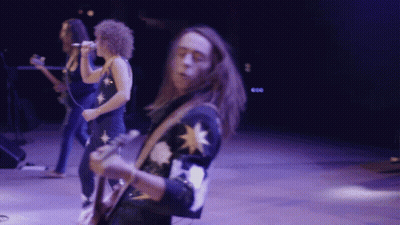 Man With Long Hair Playing Guitar In Band GIF