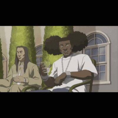 Man With Long Hair Sits Next To Another Man GIF